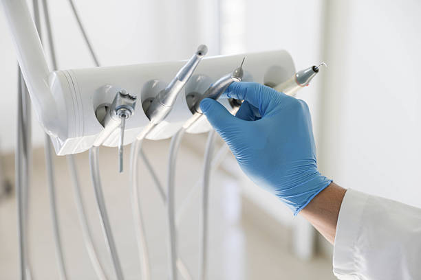 Professional Tooth Extraction technician working in Cedar County County, NE